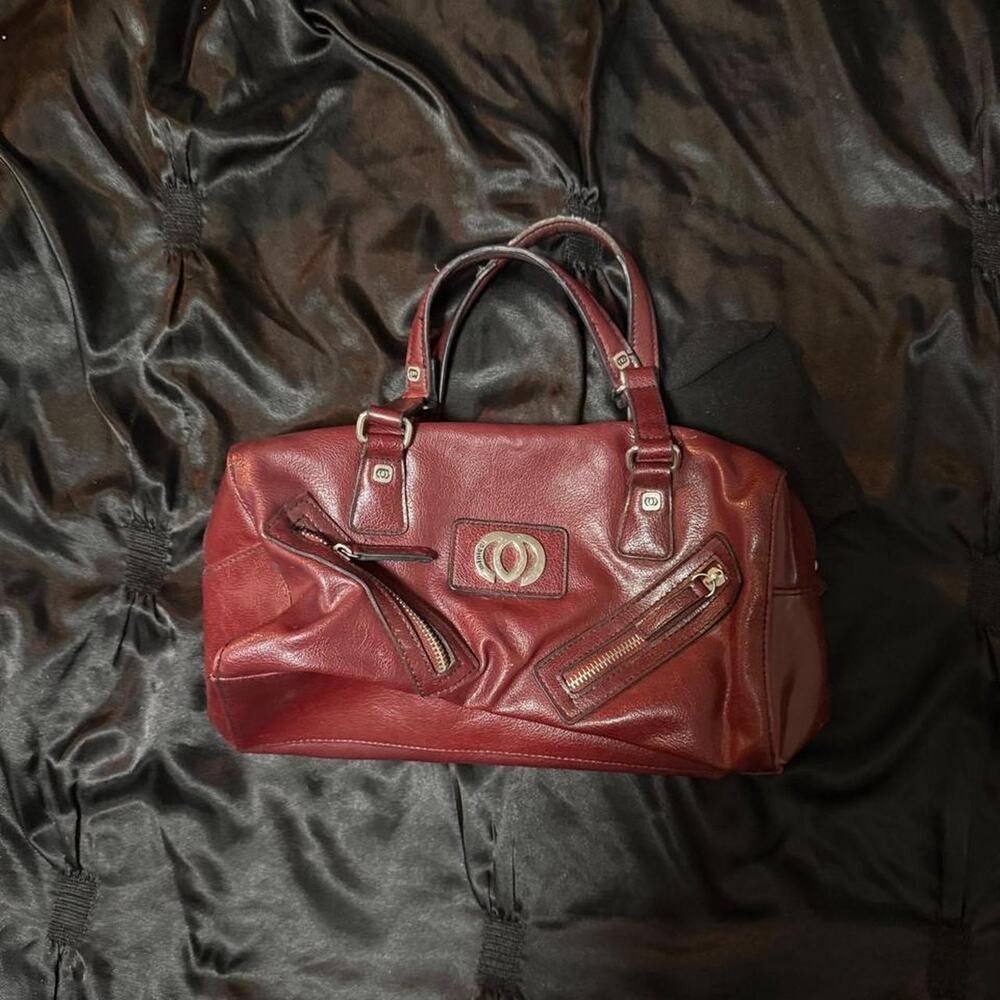 Burgundy leather handbag with gold